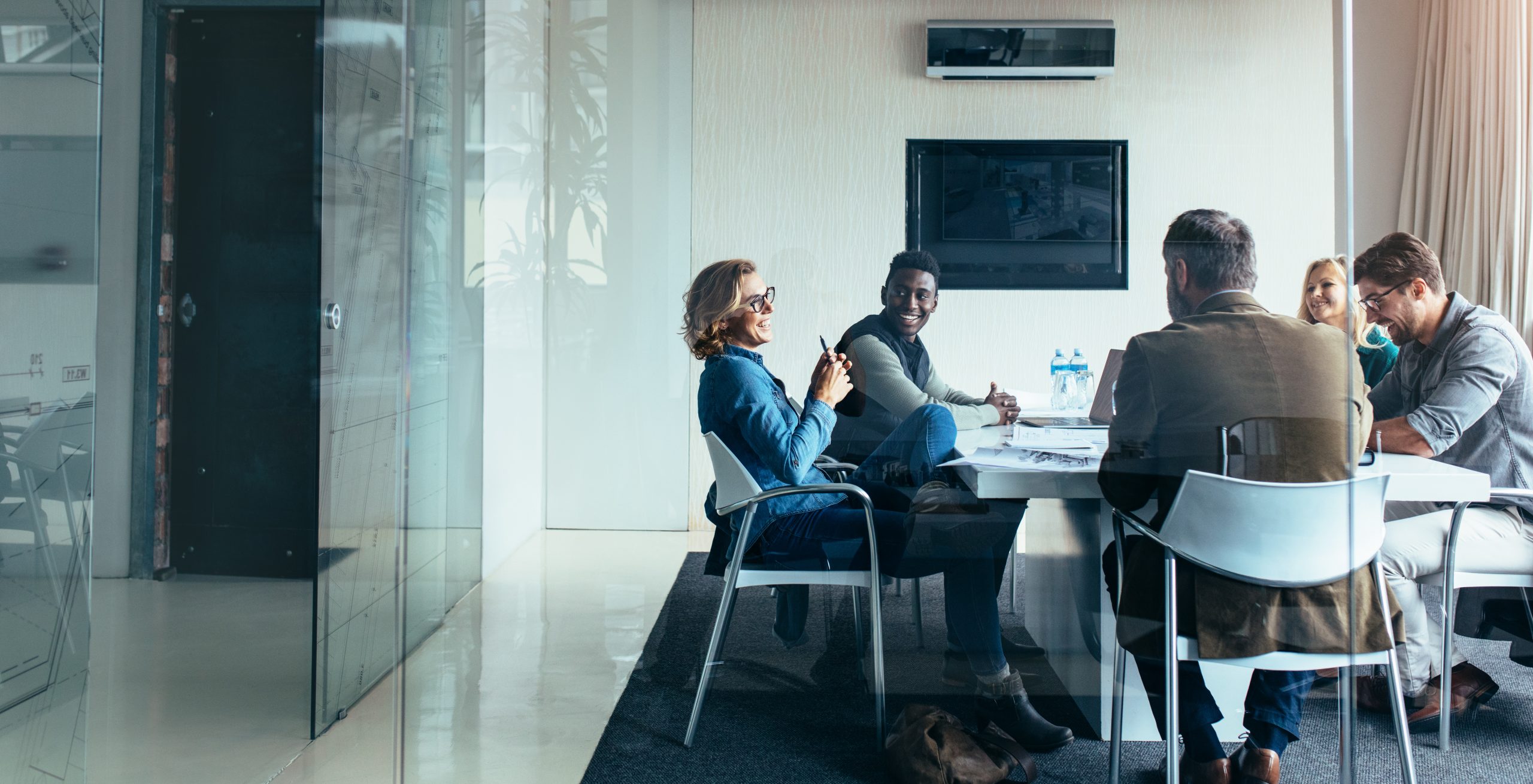 Business people discussing together in meeting